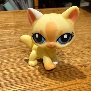 Yellow Cat Figurine with Blue Eyes
